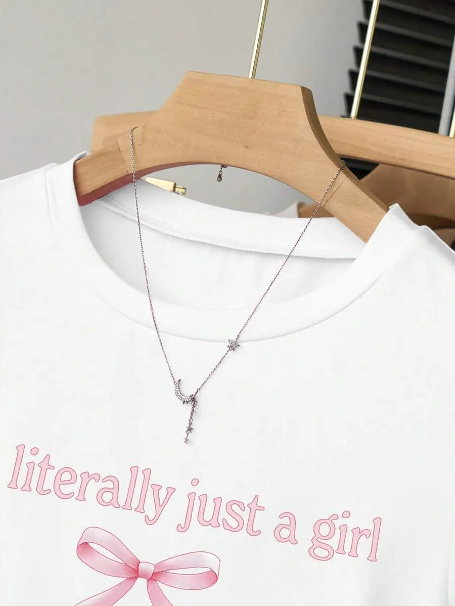 SHEIN INAWLY تي شيرت نسائي بطبعة فيونكة وحروف وياقة دائرية بلون أبيض
