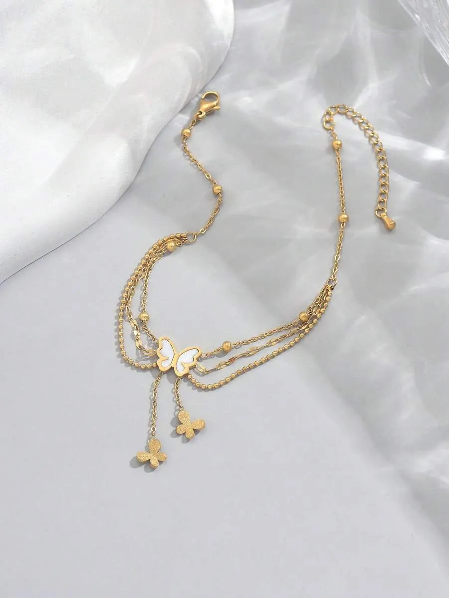 SHEIN خلخال نسائي متعدد الطبقات بتصميم فراشة ولؤلؤ بلون ذهبي مطلي بذهب 18 قيراط