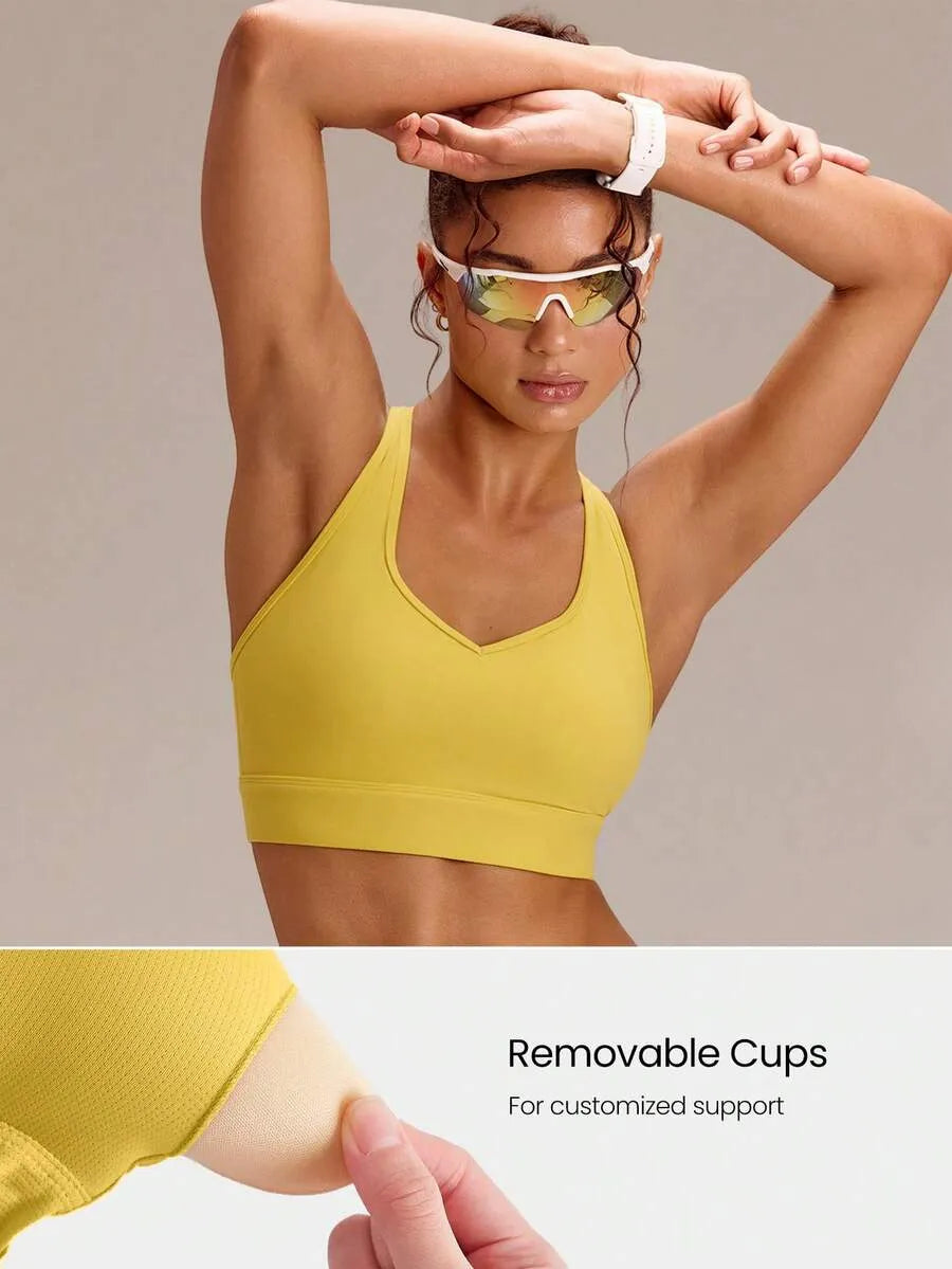 SHEIN GLOWMODE توب رياضي نسائي برقبة وظهر ريسر باك ودعم متوسط بلون أصفر مشمس