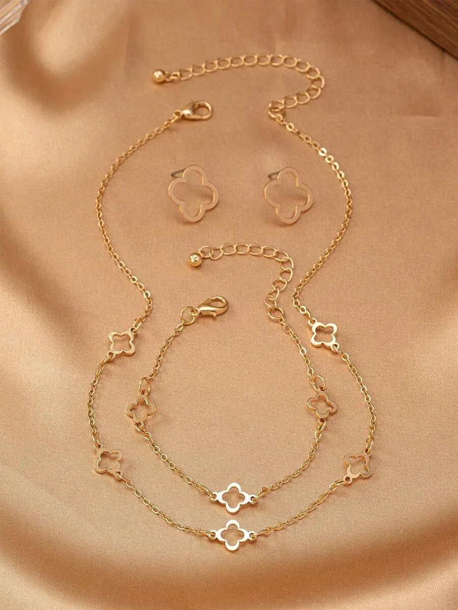 SHEIN طقم مجوهرات نسائي قلادة وسوار وأقراط بتصميم أربع أوراق برسيم وحجر الراين بلون ذهبي