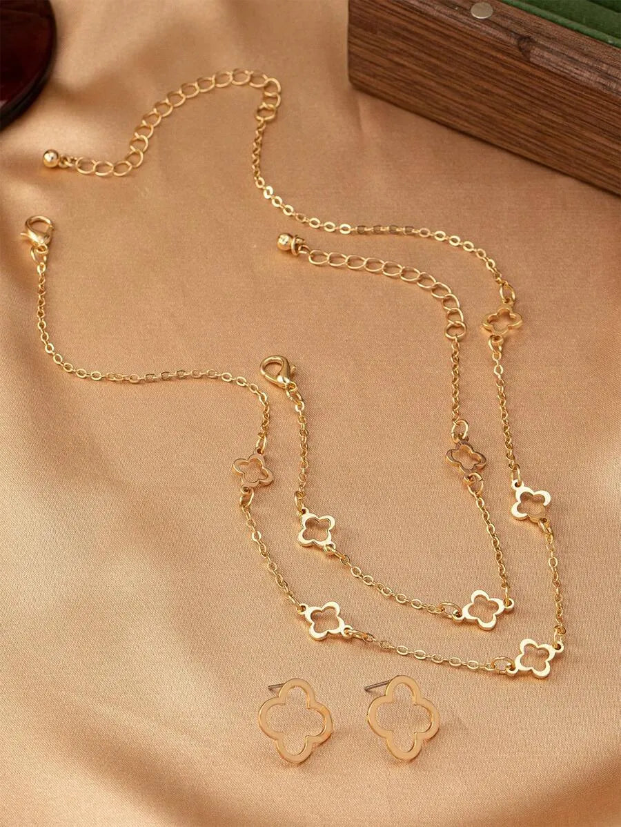 SHEIN طقم مجوهرات نسائي قلادة وسوار وأقراط بتصميم أربع أوراق برسيم وحجر الراين بلون ذهبي