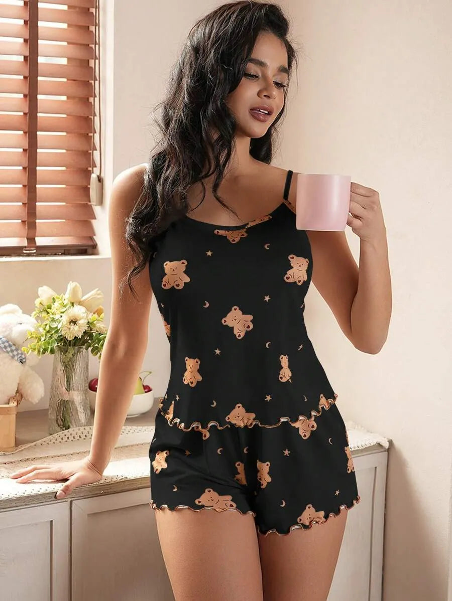 SHEIN طقم بيجامة قطعتين كاميسول وشورت بطبعة دب ونجوم بلون أسود