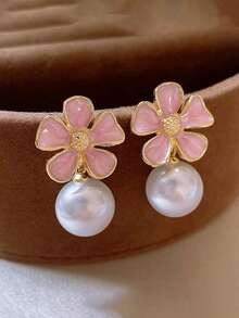 SHEIN زوج أقراط ذهبي بتصميم زهري راقي