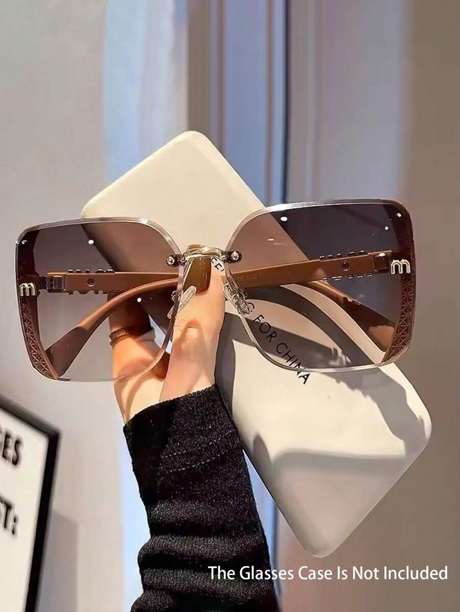 SHEIN نظارة شمس بدون إطار صميم كبير وعصري بنقشة حروف