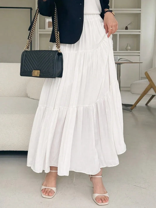 SHEIN DAZY تنورة نسائية طويلة بكسرات وطبقات متعددة من