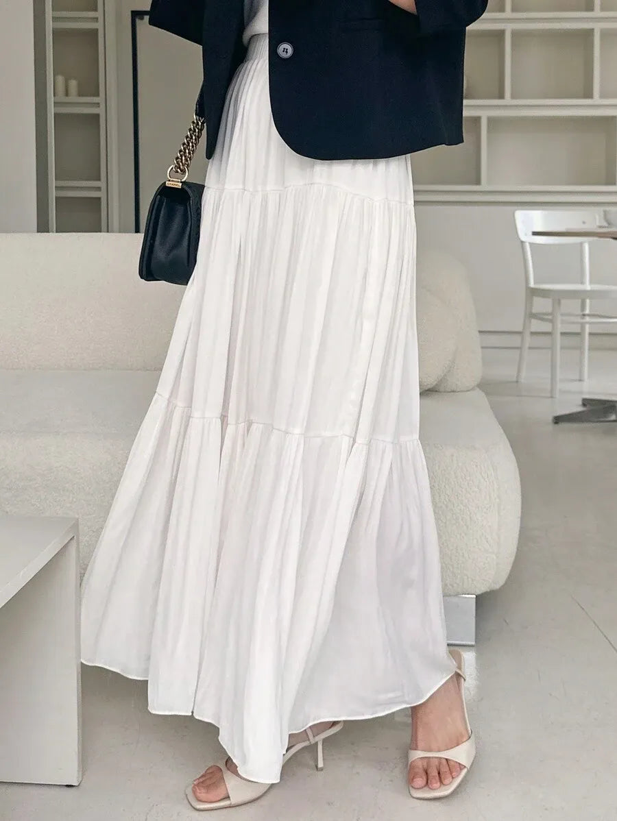 SHEIN DAZY تنورة نسائية طويلة بكسرات وطبقات متعددة من