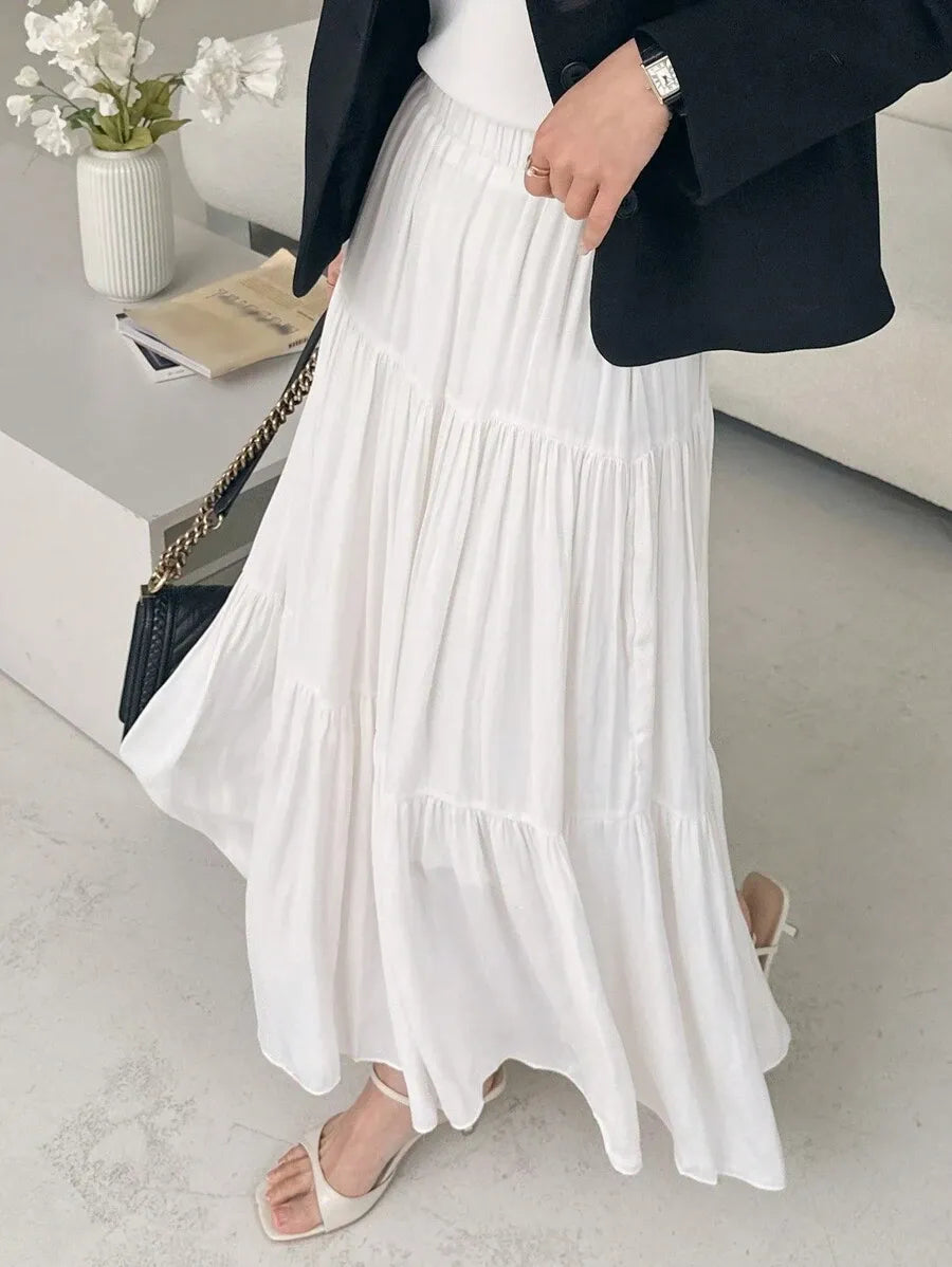 SHEIN DAZY تنورة نسائية طويلة بكسرات وطبقات متعددة من