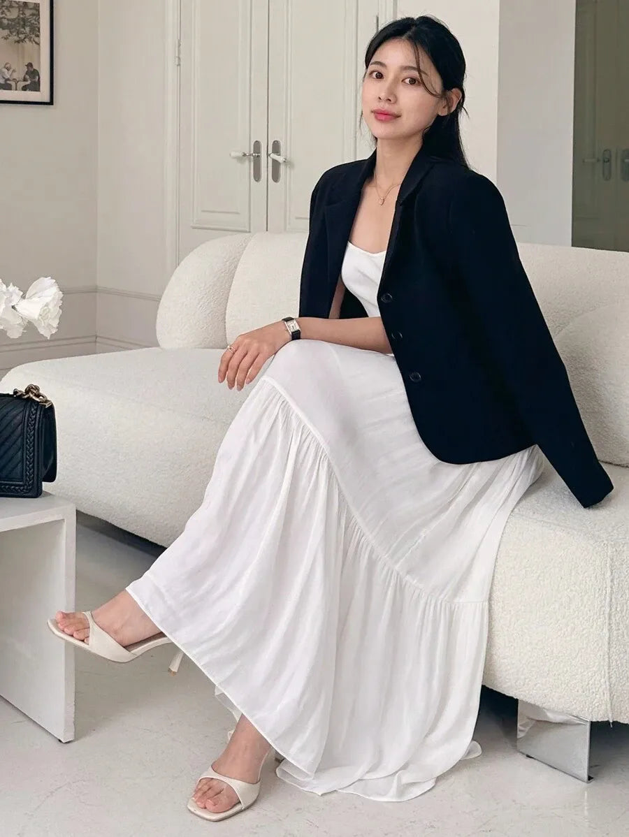 SHEIN DAZY تنورة نسائية طويلة بكسرات وطبقات متعددة من