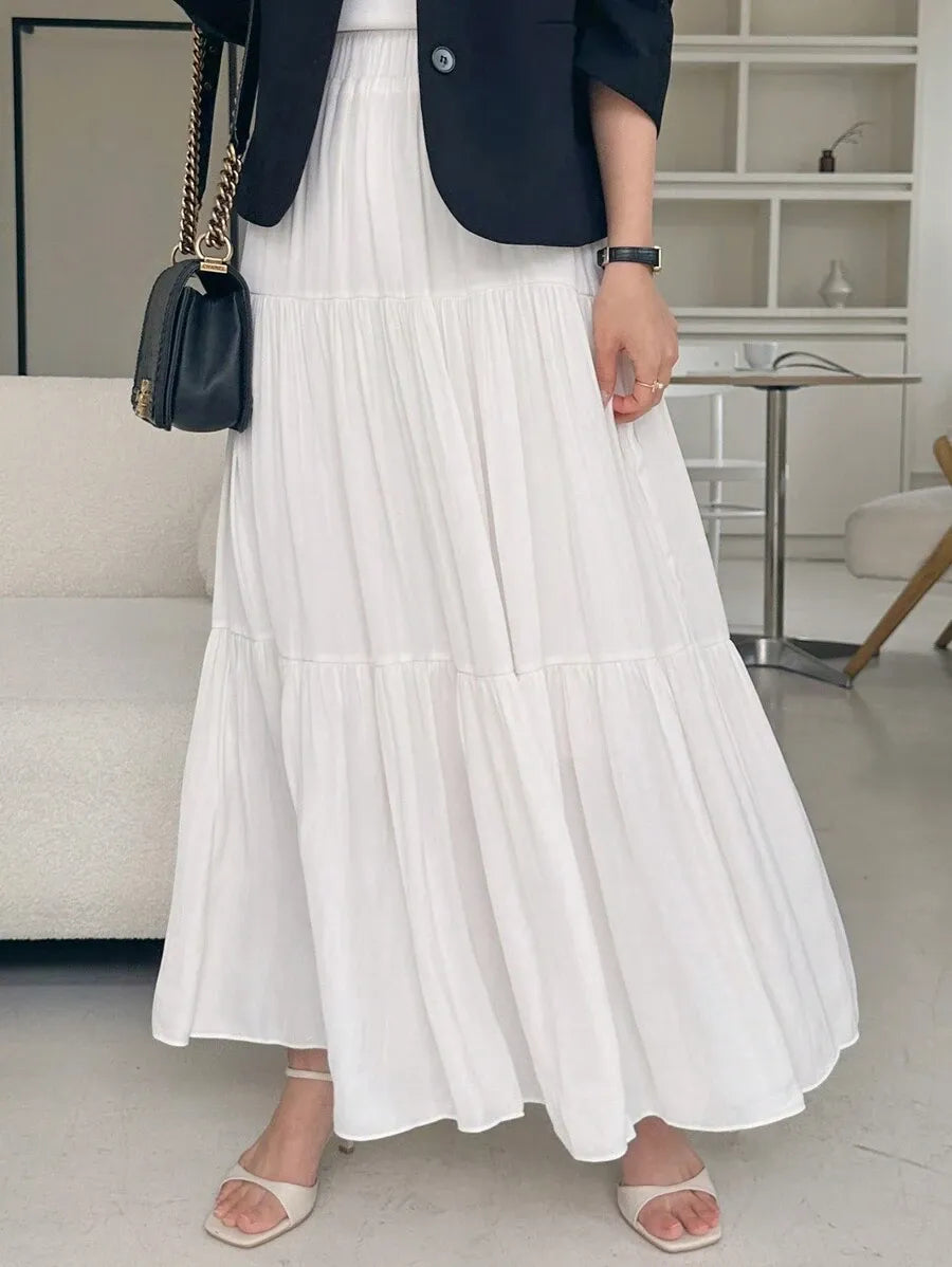 SHEIN DAZY تنورة نسائية طويلة بكسرات وطبقات متعددة من