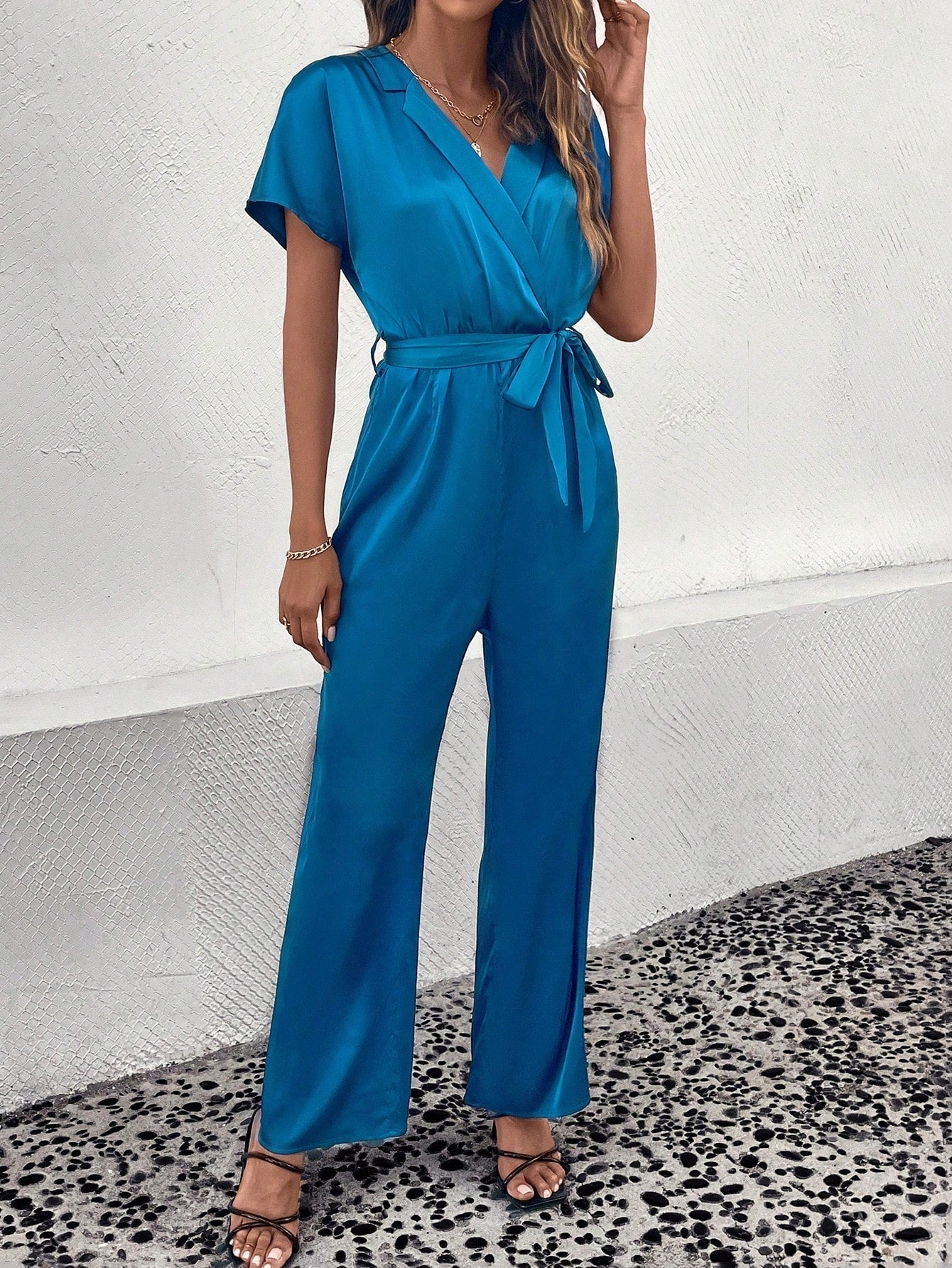SHEIN Essnce Solid Surplice Neck Belted Jumpsuit
