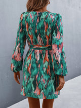 Allover Print Lantern Sleeve Belted Wrap Hem Dress